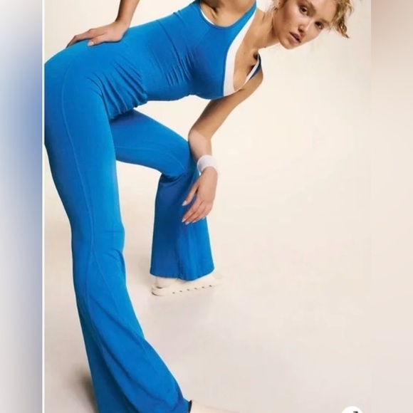 NWOT free people movement good karma flared onesie